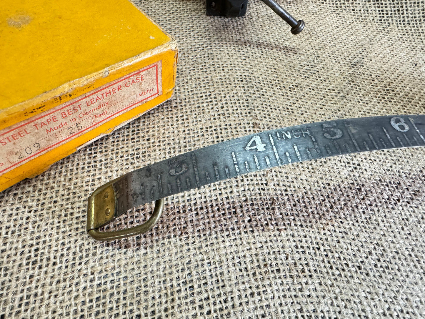 Vintage Foreign Tools No 209 25ft Steel Tape Measure with original box.